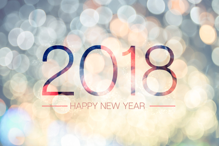 Happy new year 2018 with pale yellow bokeh light sparkling background,Holiday greeting card.