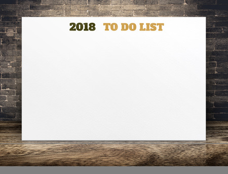 2018 to do list new year text on white paper poster on wood plank floor and brick wall,Business presentation mock up for adding your listの写真素材