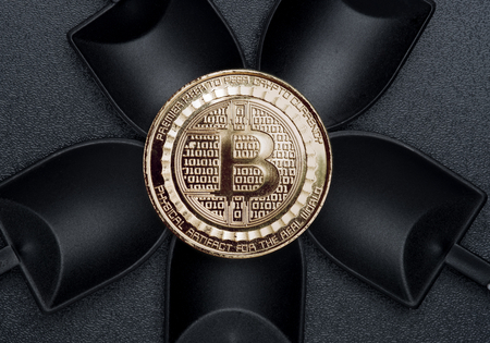 Top view bitcoins crypto coin over black shovel mining on black rough ground texture,Cryptocurrency digital moneyの写真素材