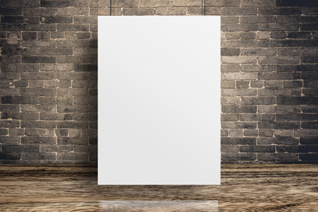 Blank white paper poster hanging at grunge brick wall and wood floor,Mock up template for adding your content or design,Business presentationの写真素材