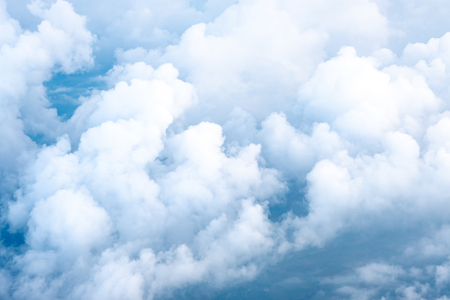 Big Blue sky and Cloud Top view from airplane window,Nature backgroundの写真素材