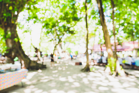 Blur abstract background of travel camping in green forestの写真素材