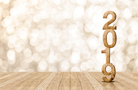 2019 happy year wood number in perspective room with sparkling bokeh wall and wooden plank floor.copy space for display of product or textの写真素材