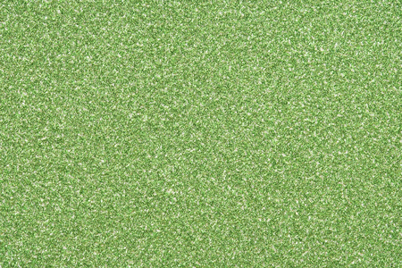 lime green sparkling glitter texture background.holiday festive backdropの写真素材
