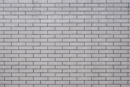 Grunge grey modern brick wall texture background,outdoor wallの写真素材