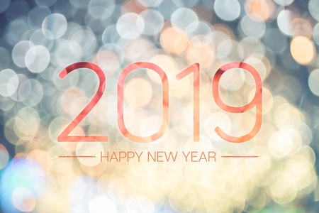 Happy new year 2019 with pale yellow bokeh light sparkling background,Holiday greeting cardの写真素材