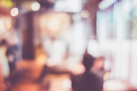 Blurred background of Customer dining at cafe restaurant blur background with bokeh light.leisure lifestyleの写真素材