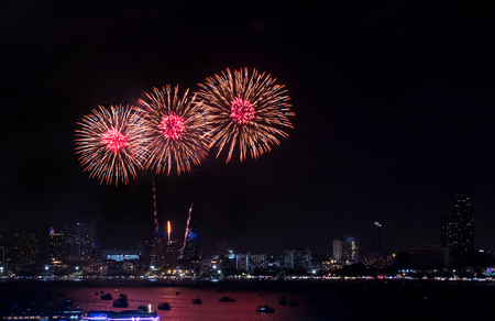 Fireworks explored over cityscape at night in Pattaya International Fireworks Festival .Holiday and celebration backgroundの写真素材