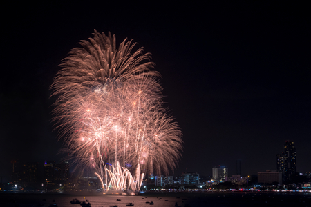 Fireworks explored over cityscape at night in Pattaya International Fireworks Festival .Holiday and celebration backgroundの写真素材