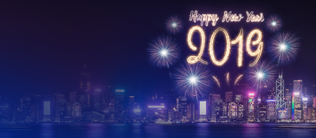Happy new year 2019 firework over cityscape building near sea at night time celebration,mock up Banner for advertise on social mediaの写真素材