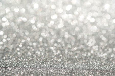 Abstract light silver sparkling glitter wall and floor perspective background studio with blur bokeh.luxury holiday backdrop mock up for display of product.holiday festive greeting cardの写真素材