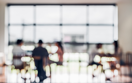 Blurred background people sitting in Coffee shop and co working space blur background with bokeh light.leisure lifestyle backdropの写真素材
