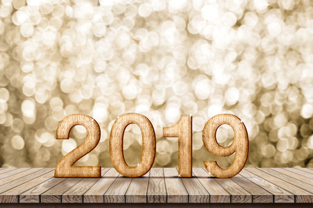 2019 happy new year wood number (3d rendering) on wood table with sparkling gold bokeh wall,leave space for display or montage of design or contentの写真素材