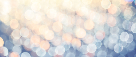 Banner size of Abstract pastel blue orange and yellow bokeh light background.light show festival at nightの写真素材