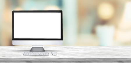 Desktop computer mock up on marble table and blurred soft light table in luxury restaurant with bokeh background. product display template.Business presentationの写真素材