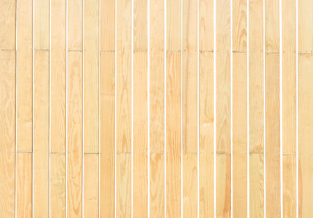 Beige wood plank vertical wall texture background isolated on whiteの写真素材