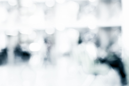 Blur background :Man reading newpaper at business building.の写真素材