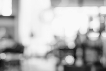 Blurred background : People in Coffee shop blur background with bokeh light with vintage filter.の写真素材