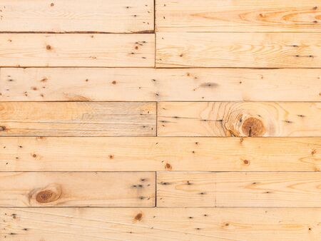 Old rustic beige color plank wood wall texture background,outdoor house wall backdrop.の写真素材