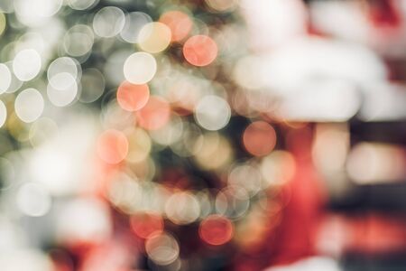 abstract blurred Christmas tree decoration with light at living room in house with bokeh background,winter holiday season celebration festivalの写真素材