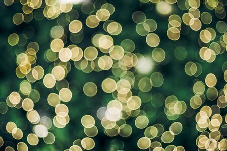 Abstract blur decoration ball and light string on christmas tree with bokeh light background.winter holiday seasonalの写真素材