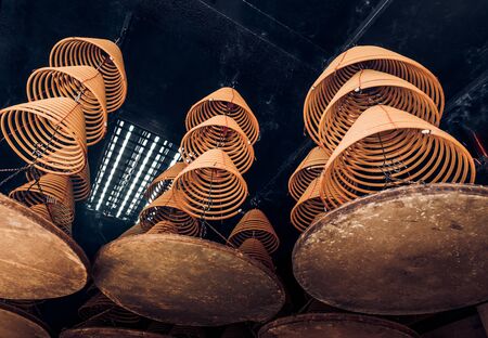 looking up at incense coil at chinese temple