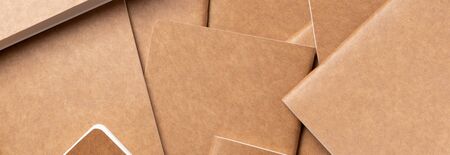 kraft brown notebook background texture.disorder alignment backdrop of book.content marketing conceptの写真素材