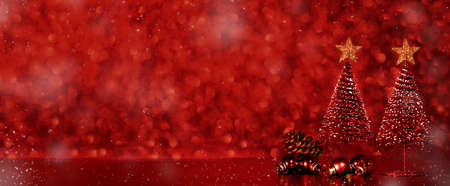 Merry Christmas tree and happy new year background on red glitter sparkling string lights festive bokeh background.holiday celebration greeting cardの写真素材