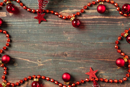 Christmas ball and pine treedecoration ornament on table wood backgroundの写真素材
