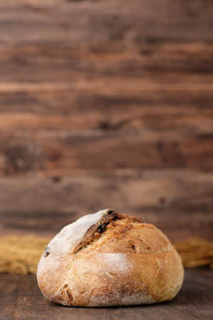 sour dough on wood table in kitchenの写真素材