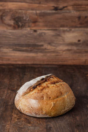 sour dough on wood table in kitchenの写真素材