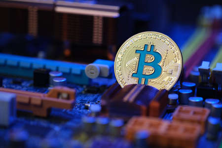 Bitcoin crypto currency on circuit board .virtual money.blockchain technology.mining conceptの写真素材