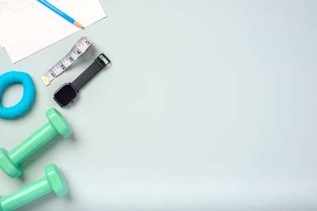 top view exercise stuff on green purple table for healty lifestyleの写真素材