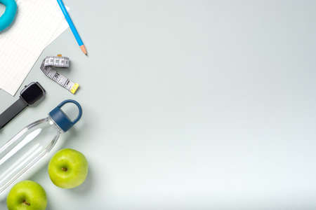 top view exercise stuff on green purple table for healty lifestyleの写真素材
