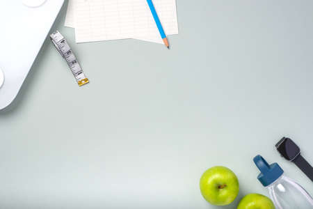 top view exercise stuff on green purple table for healty lifestyleの写真素材