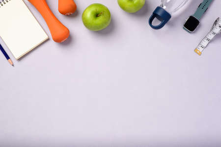 top view exercise stuff on patel purple table for healty lifestyleの写真素材