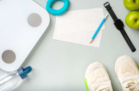 top view exercise stuff on green purple table for healty lifestyleの写真素材