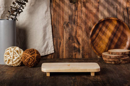 kitchenware stuff on wood counter at wood wall backgroundの写真素材