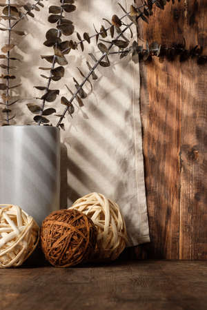 kitchenware stuff on wood counter at wood wall backgroundの写真素材