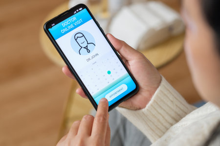 appointment consulting doctor visit on mobile app at home.telemedicineの写真素材