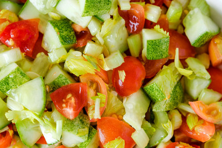 mediterranean salad in white bowl healthy food on tableの写真素材