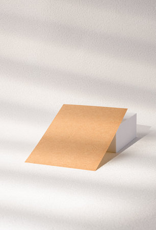mockup blank kraft business card on white block with sunlightの写真素材
