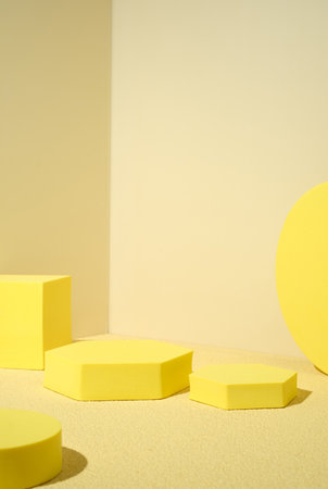 Yellow pedestal product display background with modern geometric block in sunshine light with summer feelの写真素材