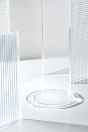 Transparency pedestal product display high key white background of modern Transparency strip glass with sunshine lightの写真素材