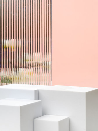 White block pedestal product display peach background with modern Transparency strip glass  and flower with sunshine lightの写真素材