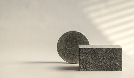 Minimal stone stage product display with sunlight from window on cream color backgroundの写真素材
