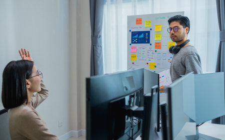 Developer ask question to team present project interface design with board and solving problem at...