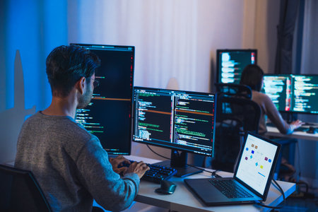 asian woman  and Indian man Developer team working  about devops programming software data online ...