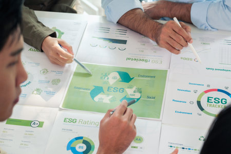 close up diversity team brainstorming focused on ESG (environment,social,governance)  for sdgs goals in a sustainable green officeの写真素材