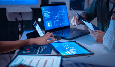 close up team of financial discussion fintech  technology planning, analyzing digital financial data...